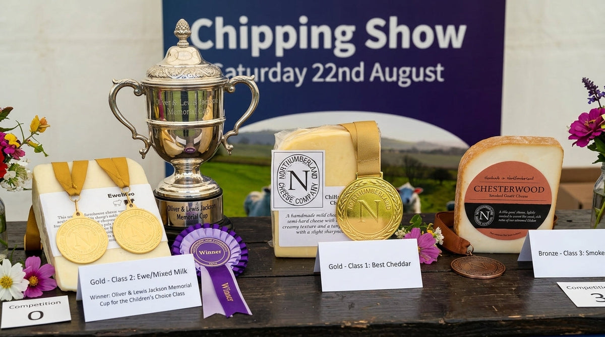 EweMoo, Chillingham Cheddar and Chesterwood with their Chipping Show medals, the Children's Choice cup and a Winner rosette