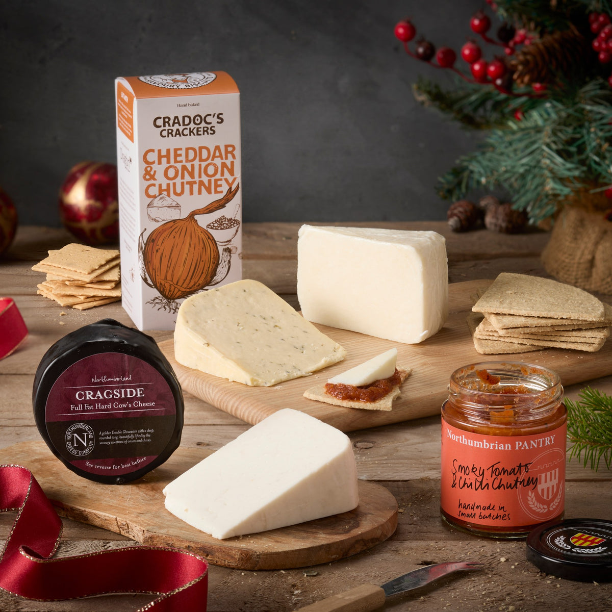 A Whey in a Manger: a Cragside truckle, three cheese wedges, oatcakes, Cradoc's crackers and a jar of smoky tomato and chilli chutney