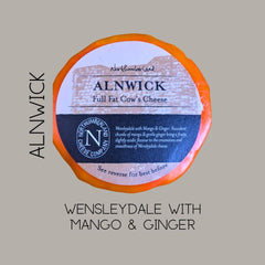 Close-up of the orange-waxed Alnwick truckle label, captioned Wensleydale with mango and ginger