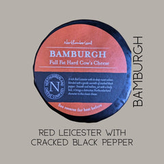 Close-up of the black-waxed Bamburgh truckle label, captioned Red Leicester with cracked black pepper