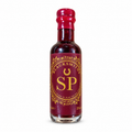 Small bottle of Blacksmiths SP, a blend of sloe gin and port wine, with a deep red and gold label and red wax seal