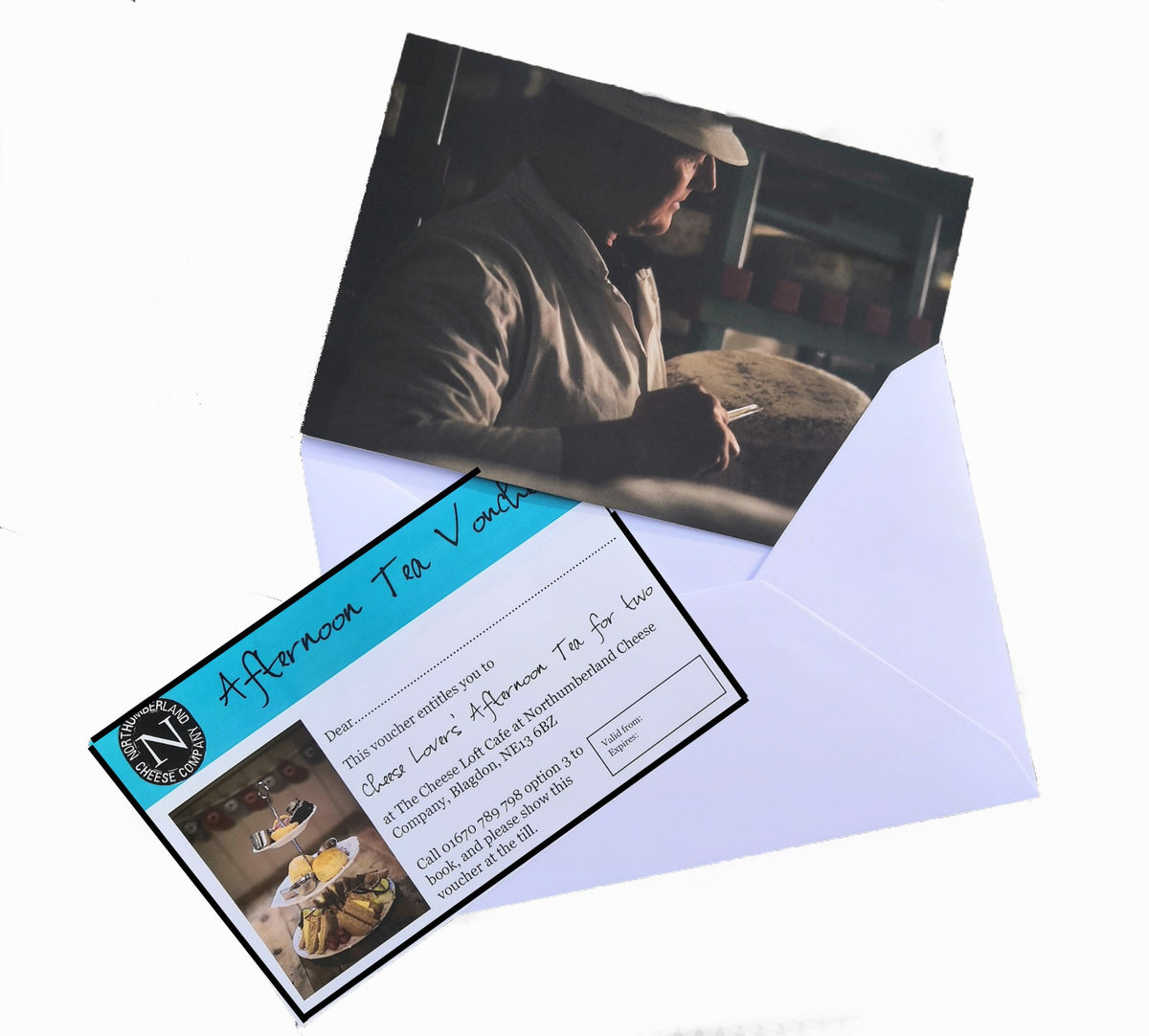 Cheese Lovers' Afternoon Tea for Two gift voucher with its white envelope and a card of a cheesemaker at work