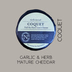 Coquet truckle on a grey background, captioned garlic and herb mature cheddar