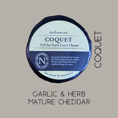 Coquet truckle on a grey background, captioned garlic and herb mature cheddar