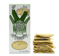 Cradoc's Leek & Caerphilly Crackers 80g box illustrated with leeks and Caerphilly, beside a stack of square crackers