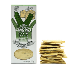 Cradoc's Leek & Caerphilly Crackers 80g box illustrated with leeks and Caerphilly, beside a stack of square crackers