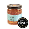 200g jar of Northumbrian Pantry Chilli Jelly, flecked with chilli, shown with a Great Taste 2024 one-star award badge