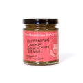210g jar of Northumbrian Pantry Spiced Plum & Apple Chutney with a pink hand-lettered label and black lid