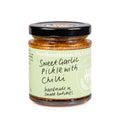 210g jar of Northumbrian Pantry Sweet Garlic Pickle with Chilli, with a sage-green hand-lettered label and black lid