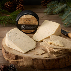 We 3 Cheeses Box: an Alnwick truckle with wedges of Nettle and Chilli cheese and oatcakes on a log board