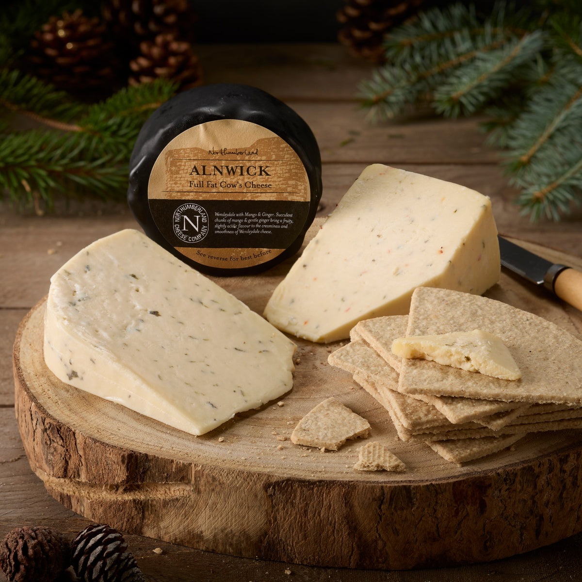 We 3 Cheeses Box: an Alnwick truckle with wedges of Nettle and Chilli cheese and oatcakes on a log board